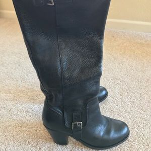 Tall leather Ariat boots with buckle